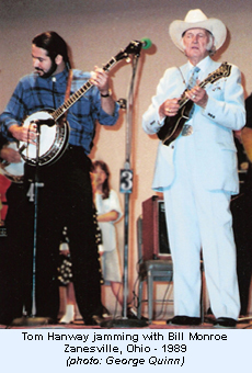 Tom Hanway jamming on stage with Bill Monroe